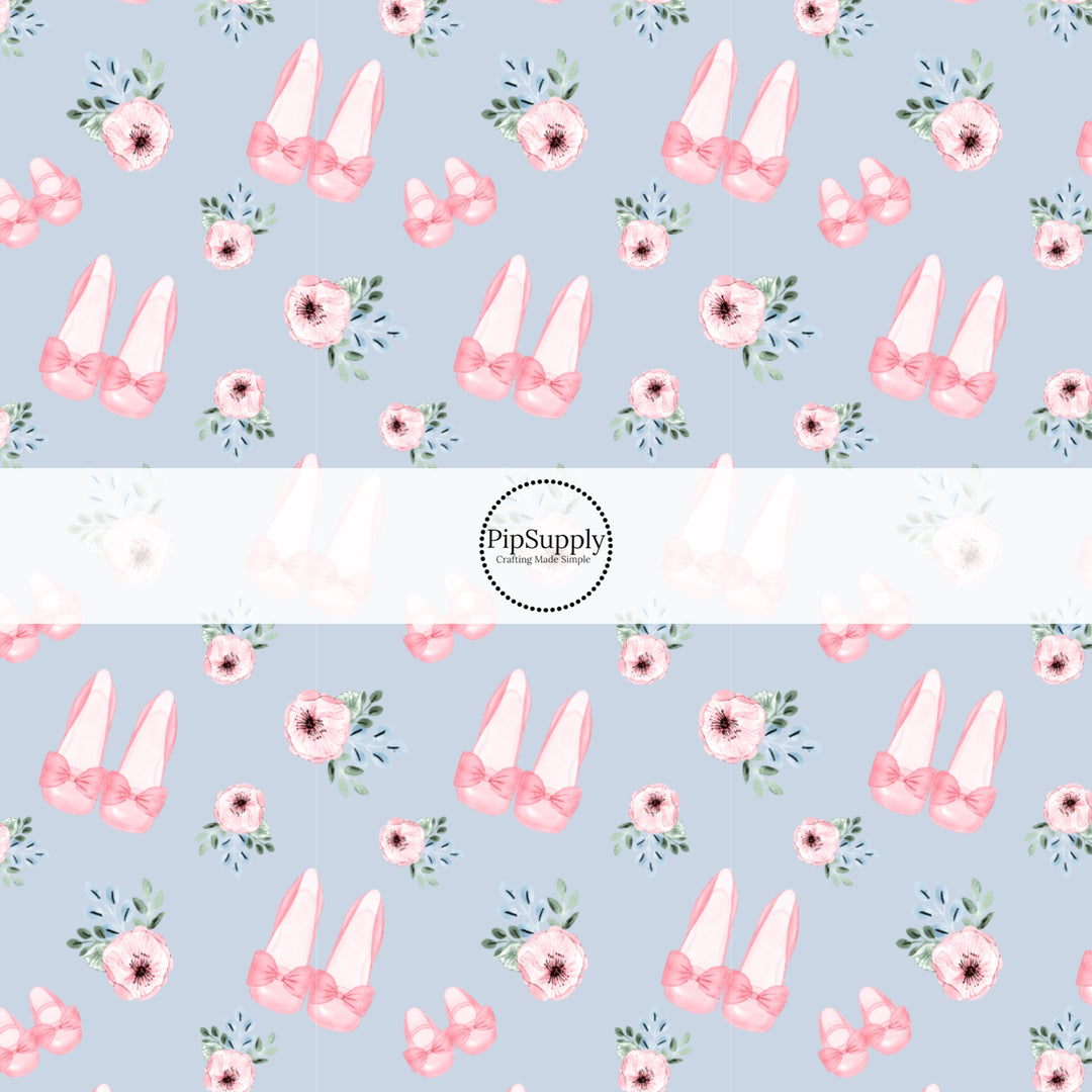 This summer fabric by the yard features pink roses and ballet shoes on blue. This fun summer themed fabric can be used for all your sewing and crafting needs!