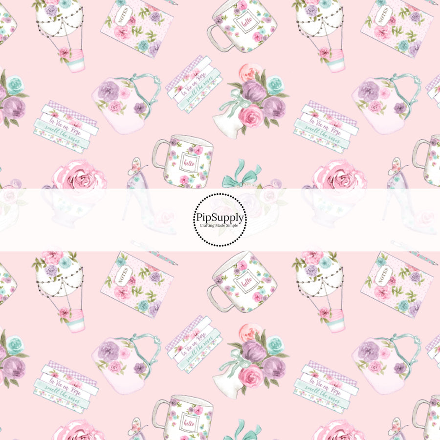 This summer fabric by the yard features multi colored roses, tea cups, and tea pots on light pink. This fun summer themed fabric can be used for all your sewing and crafting needs!