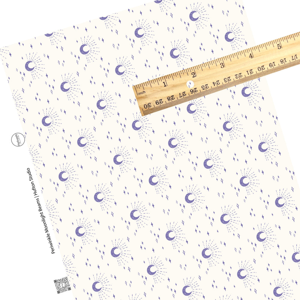 These moon themed light cream faux leather sheets contain the following design elements: purple crescent moons surrounded by moonlight beams and small stars on ivory.  Our CPSIA compliant faux leather sheets or rolls can be used for all types of crafting projects. 