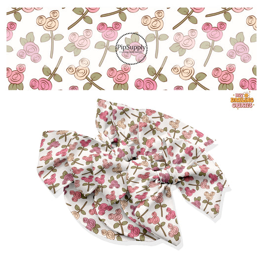 These magical inspired themed no sew bow strips can be easily tied and attached to a clip for a finished hair bow. These fun themed patterned bow strips are great for personal use or to sell. These bow strips feature the following dusty pink and cream mouse ears roses.