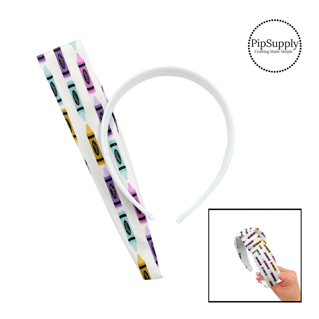 Aqua, yellow, pink, and purple crayons on white knotted headband kit