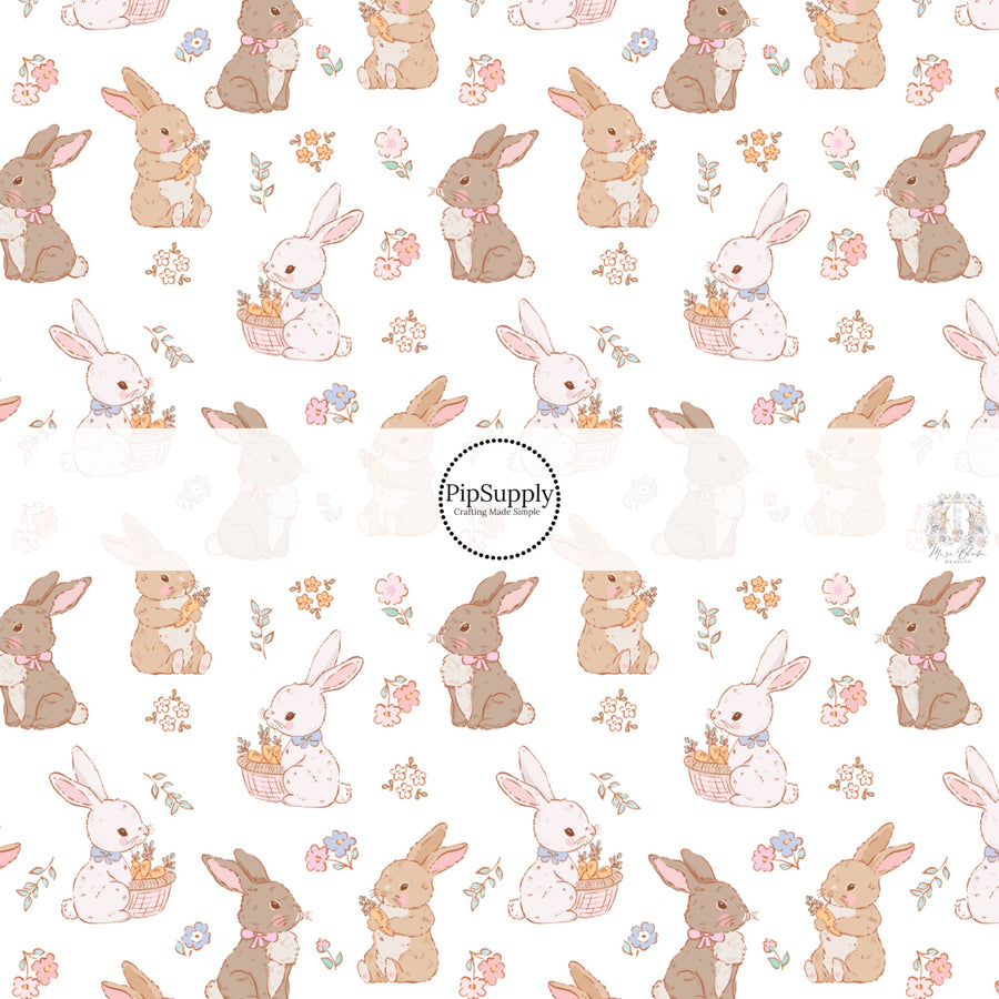 These spring fabric by the yard features bunnies surrounded by flowers and carrots. This fun pattern fabric can be used for all your sewing and crafting needs!