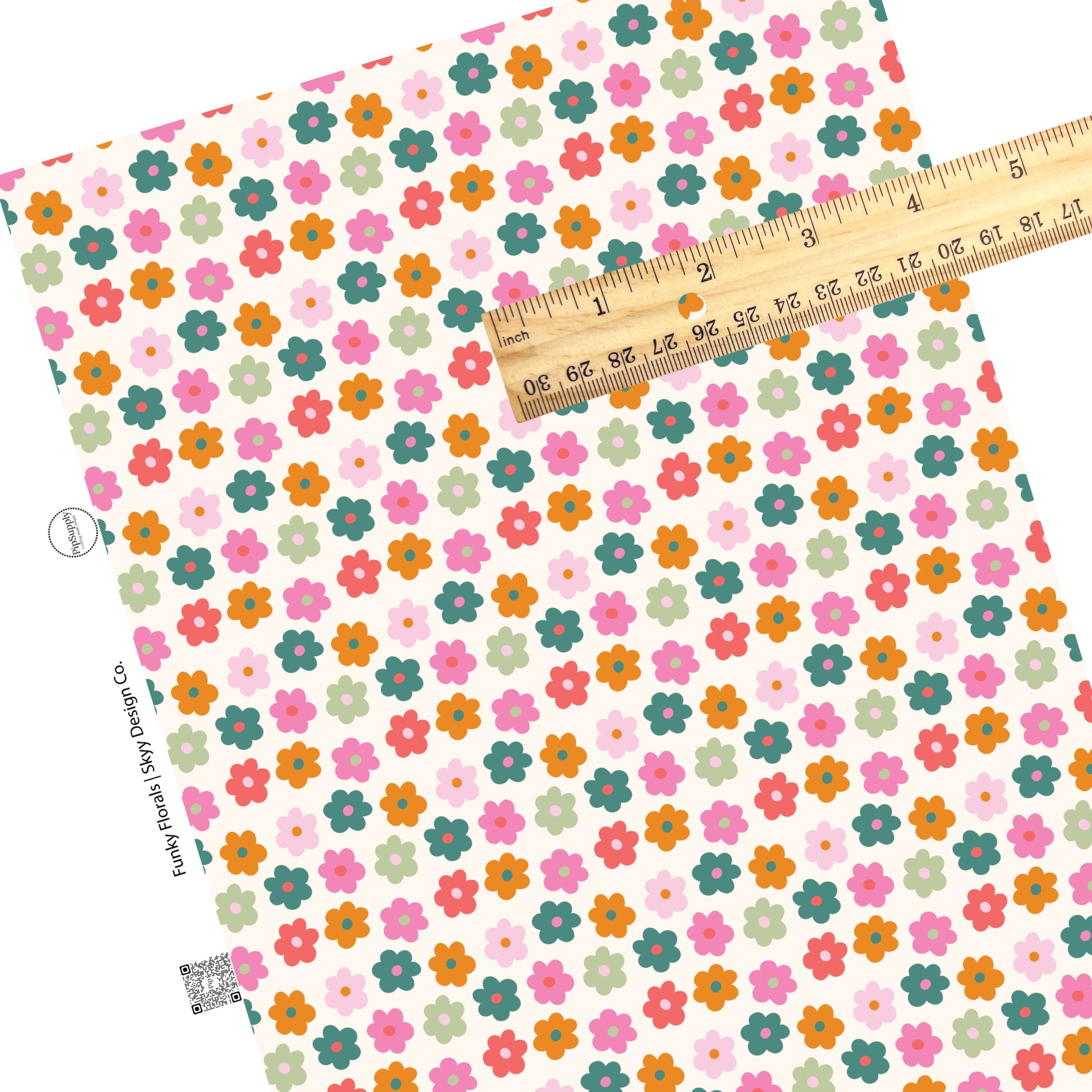 Multi colored daisies on cream faux leather sheets