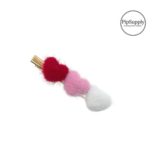Red, pink, and white fuzzy heart hair clip