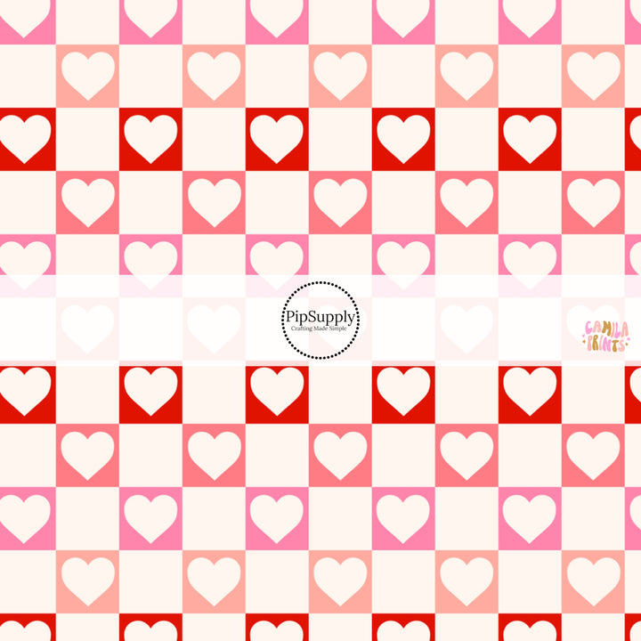 This holiday fabric by the yard features hearts on cream, red and pink checkers. This festive pattern fabric can be used for all your sewing and crafting needs!