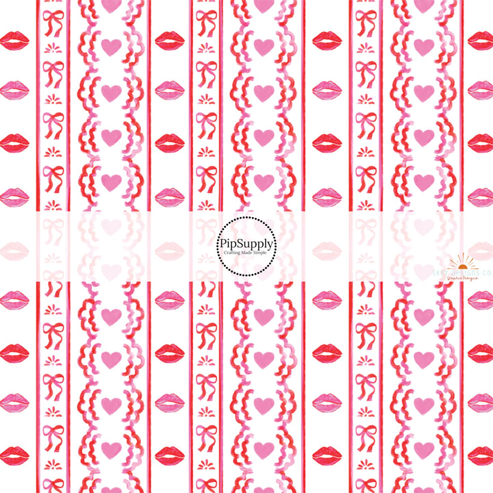 This holiday fabric by the yard features red and pink kisses and hearts between stripes. This festive pattern fabric can be used for all your sewing and crafting needs.