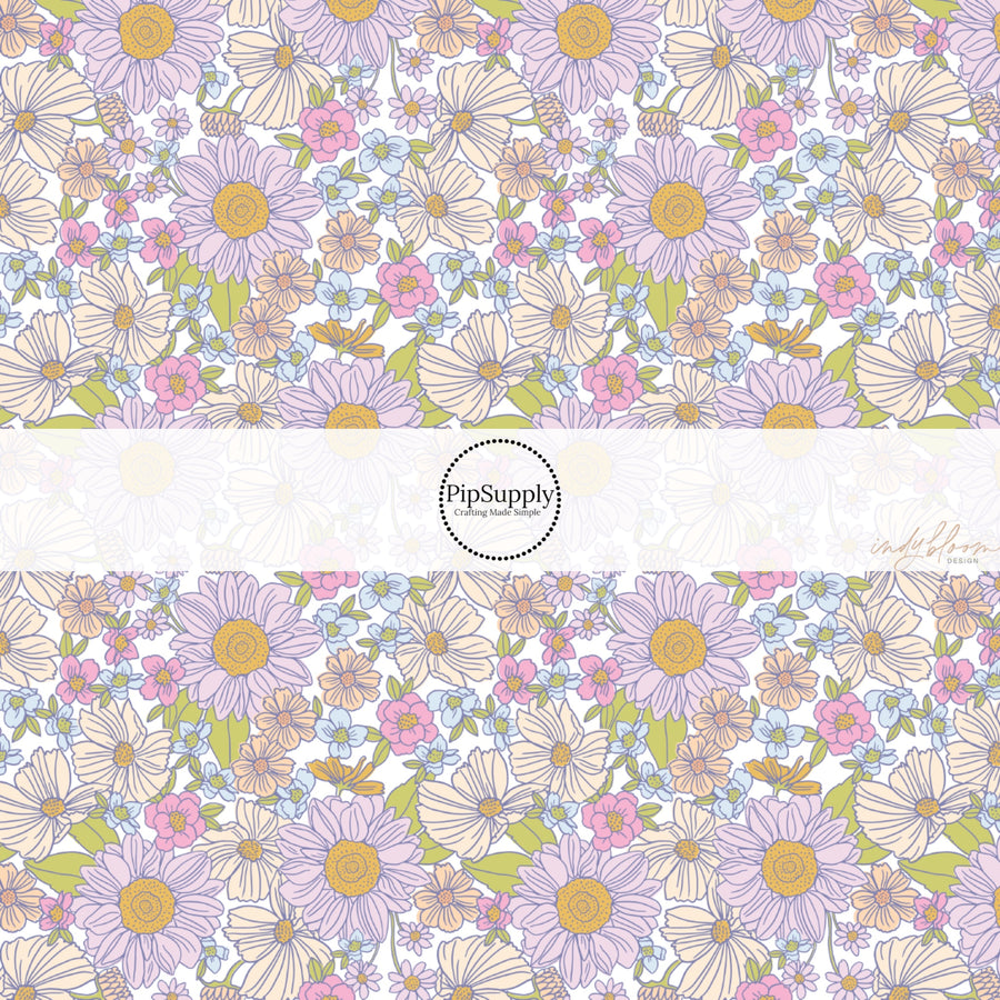 These spring fabric by the yard features lilac and peach floral patterns. This fun pattern fabric can be used for all your sewing and crafting needs!