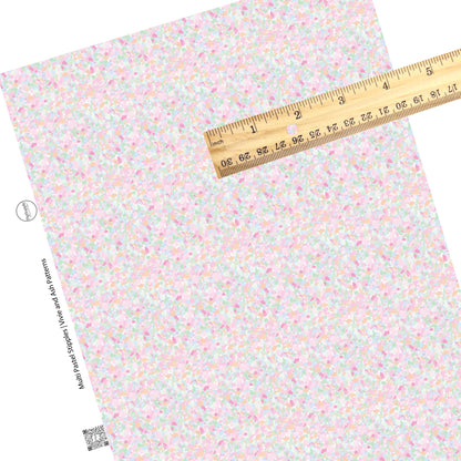 These spring pattern themed faux leather sheets contain the following design elements: pastel stipples on cream. Our CPSIA compliant faux leather sheets or rolls can be used for all types of crafting projects.