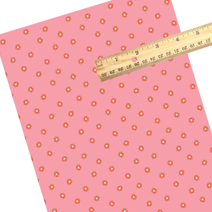 These Halloween themed pattern faux leather sheets contain the following design elements: tiny flowers on pink. Our CPSIA compliant faux leather sheets or rolls can be used for all types of crafting projects.