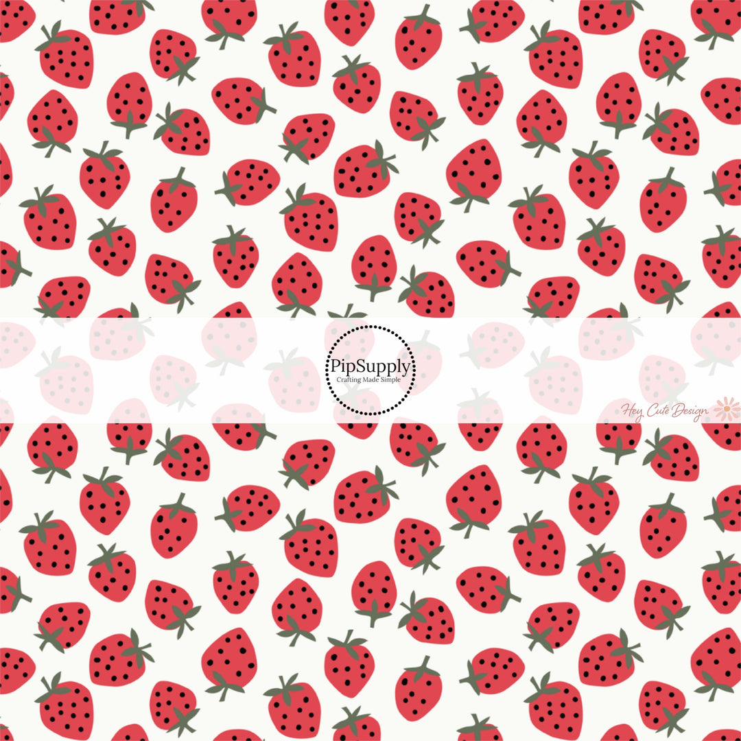 This holiday fabric by the yard features red strawberries. This festive pattern fabric can be used for all your sewing and crafting needs!