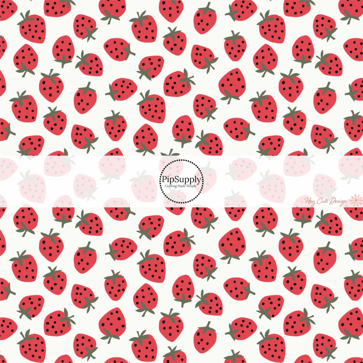 This holiday fabric by the yard features red strawberries. This festive pattern fabric can be used for all your sewing and crafting needs!