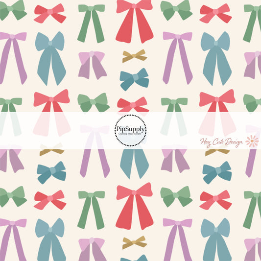Multi Colored Coquette Bows on Cream Fabric by the Yard.
