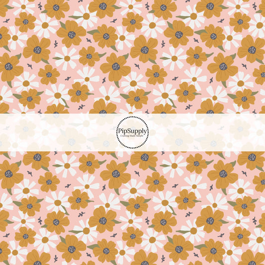 This summer fabric by the yard features multi colored flowers on pink. This fun summer themed fabric can be used for all your sewing and crafting needs!