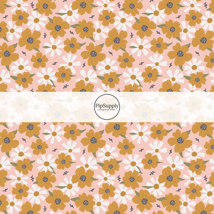 This summer fabric by the yard features multi colored flowers on pink. This fun summer themed fabric can be used for all your sewing and crafting needs!