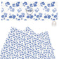 These floral themed light cream faux leather sheets contain the following design elements: periwinkle flowers on cream.