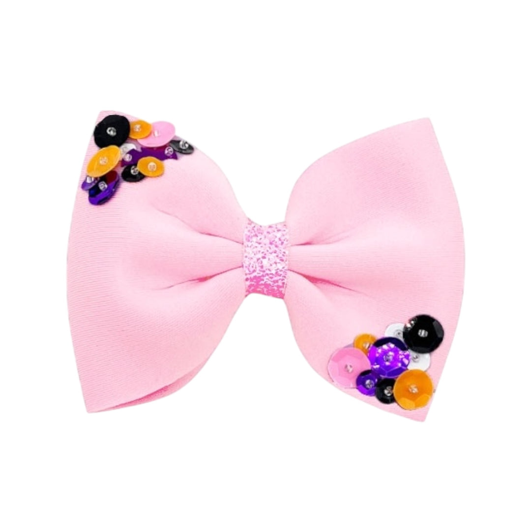 Theses Halloween neoprene multi sequin hair bows are ready to package and resell to your customers no sewing or measuring necessary! These come pre-tied with an attached alligator clip. The Halloween themed bow is perfect for all hair styles for kids and adults.
