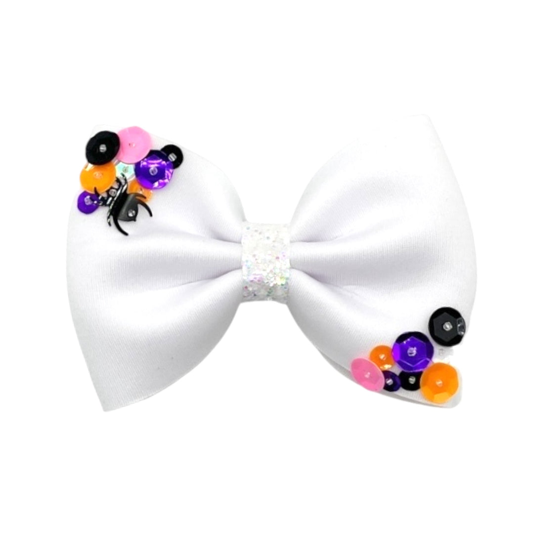 Theses Halloween neoprene multi sequin hair bows are ready to package and resell to your customers no sewing or measuring necessary! These come pre-tied with an attached alligator clip. The Halloween themed bow is perfect for all hair styles for kids and adults.