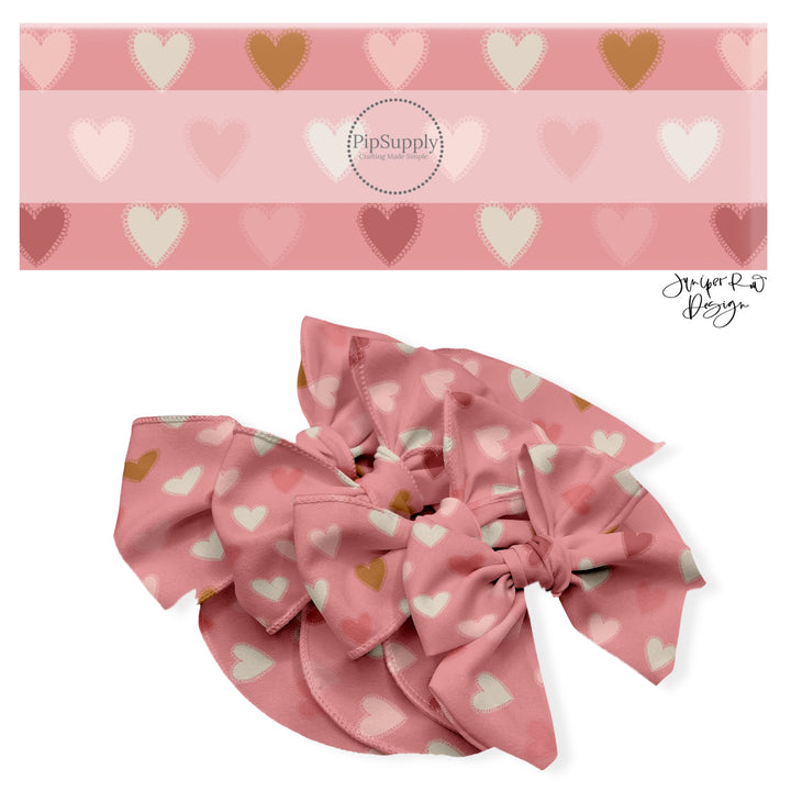 These holiday no sew bow strips can be easily tied and attached to a clip for a finished hair bow. These festive bow strips are great for personal use or to sell. These bow strips feature the following design elements: neutral color hearts on pink.