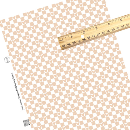 This magical inspired faux leather sheets contain the following design: nude and cream checker pattern with mouse ears. Our CPSIA compliant faux leather sheets or rolls can be used for all types of crafting projects.