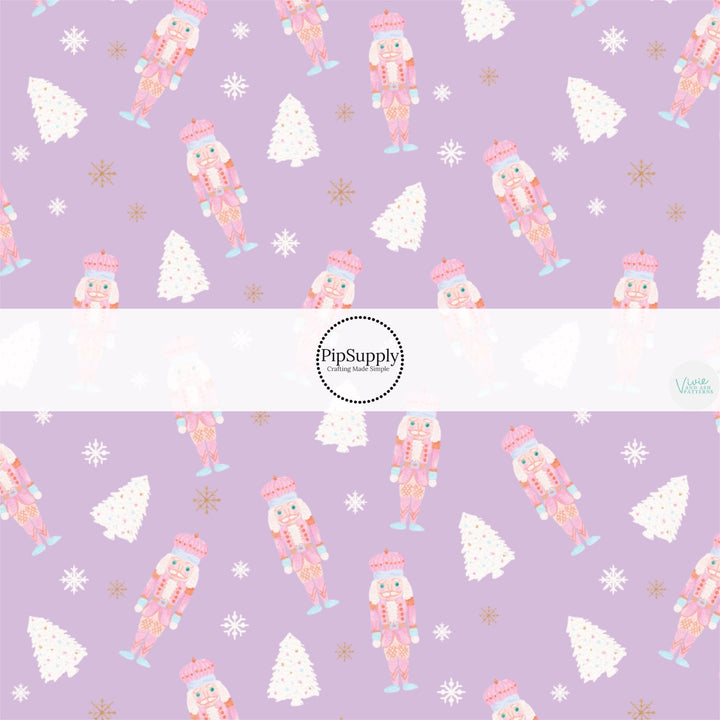 These Christmas themed pattern fabric by the yard features the following design elements: Christmas nutcrackers on lilac. This fun themed fabric can be used for all your sewing and crafting needs!