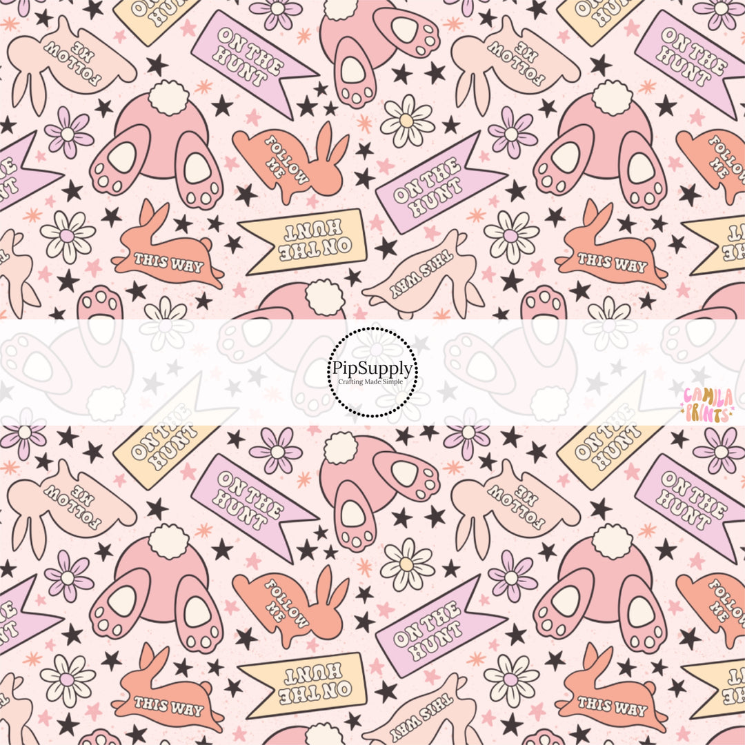 This Easter themed fabric by the yard features Easter bunnies, flowers, and spring sayings. This fun pattern fabric can be used for all your sewing and crafting needs!