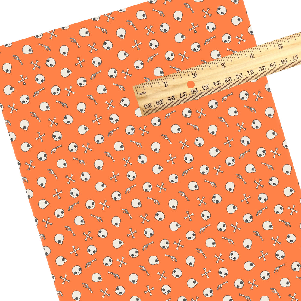 These Halloween themed pattern faux leather sheets contain the following design elements: skulls and bones on orange. Our CPSIA compliant faux leather sheets or rolls can be used for all types of crafting projects.