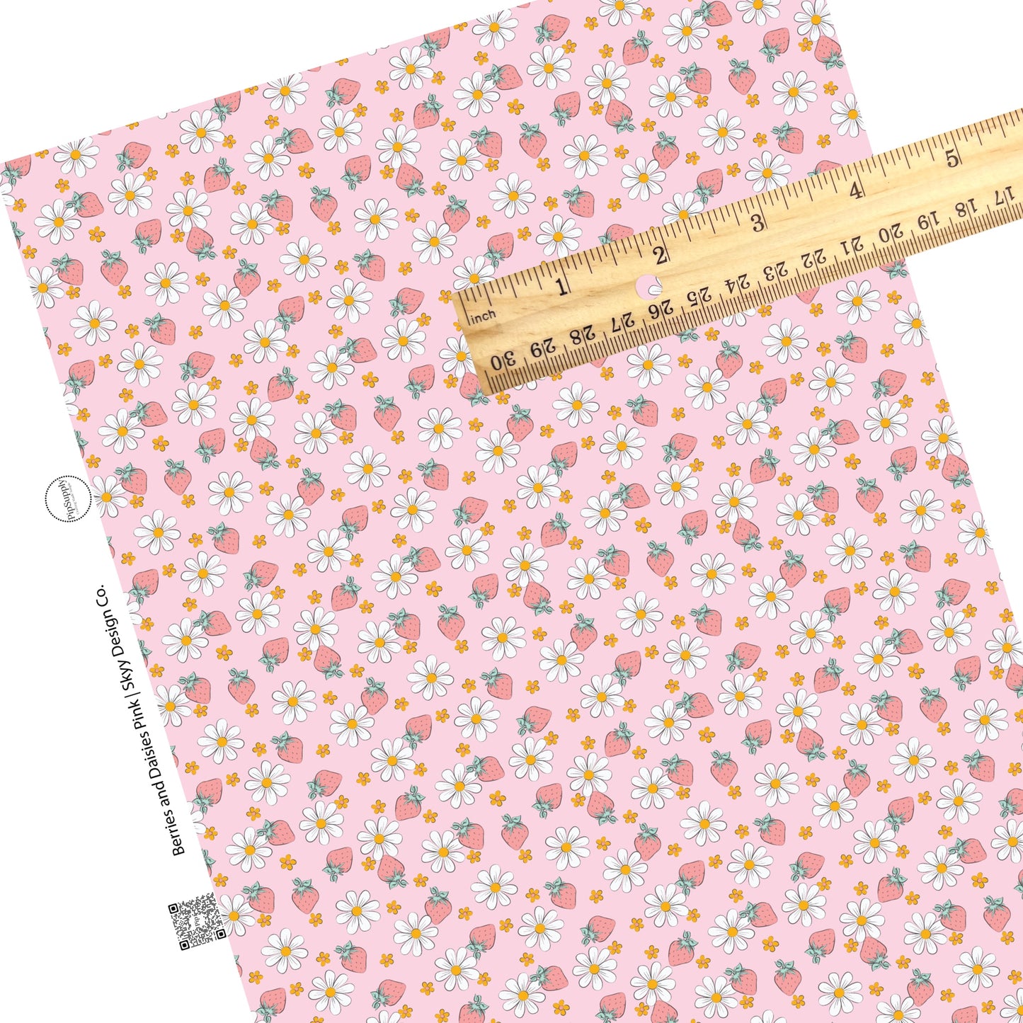 Orange flowers, white daisies and pastel strawberries on pink faux leather sheets.