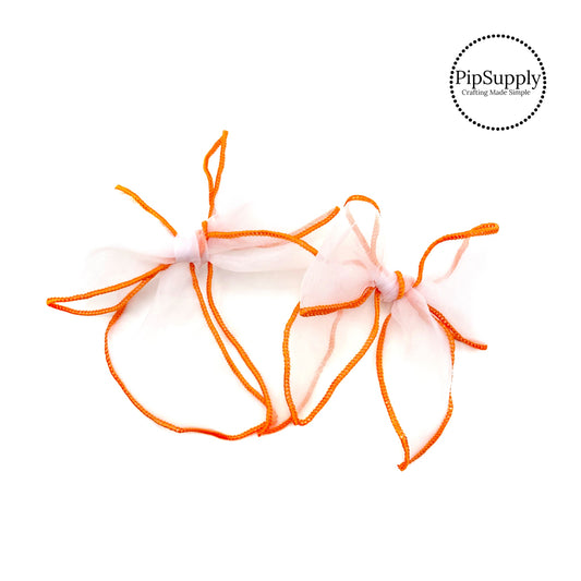 Orange stitches on white shaker hair bow strips