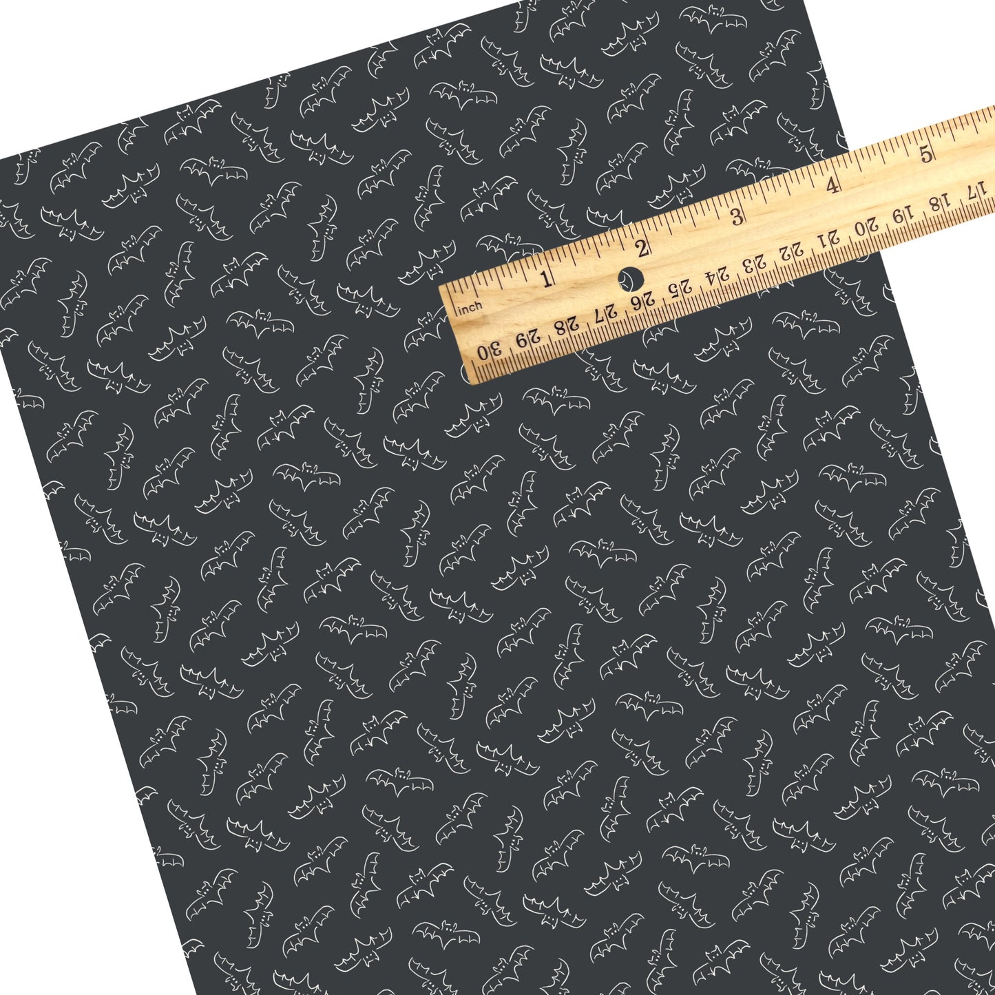 These Halloween themed pattern faux leather sheets contain the following design elements: bat outlines on black. Our CPSIA compliant faux leather sheets or rolls can be used for all types of crafting projects.