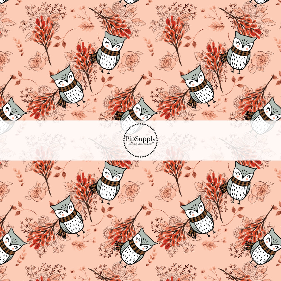 These fall themed peach fabric by the yard features autumn branches and leaves with owls on light pink. This fun fall themed fabric can be used for all your sewing and crafting needs! 