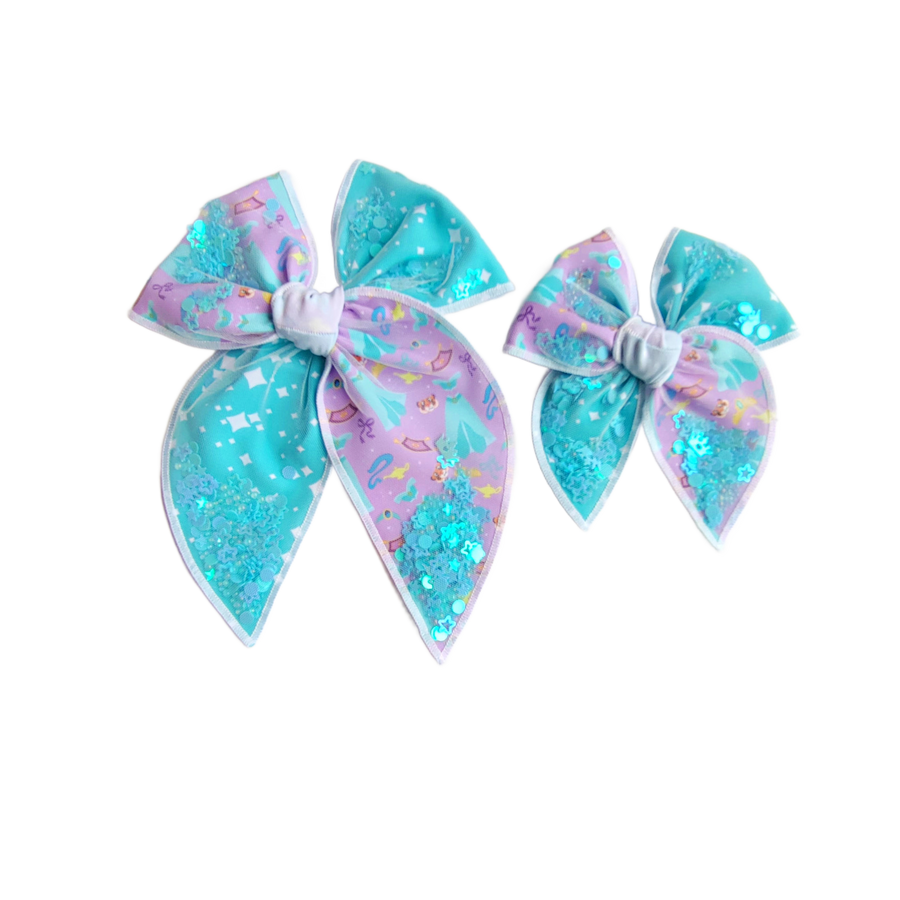 These princess themed shaker two toned pre-cut tied bows are ready to package and resell to your customers no sewing or measuring necessary! These hair bows come with a clip already attached. The shaker bows come pre-filled with princess inspired pattern mix.