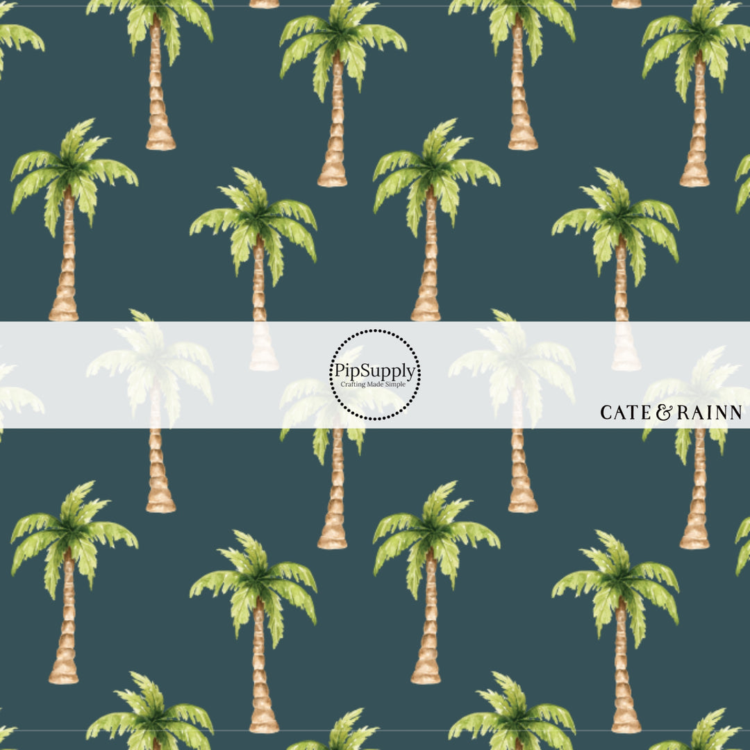 These tropical themed blue fabric by the yard features palm trees on navy blue. This fun beach themed fabric can be used for all your sewing and crafting needs! 