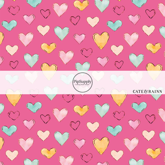 These heart themed pink fabric by the yard features light pink, orange, and blue watercolor hearts on hot pink. This fun summer heart themed fabric can be used for all your sewing and crafting needs! 