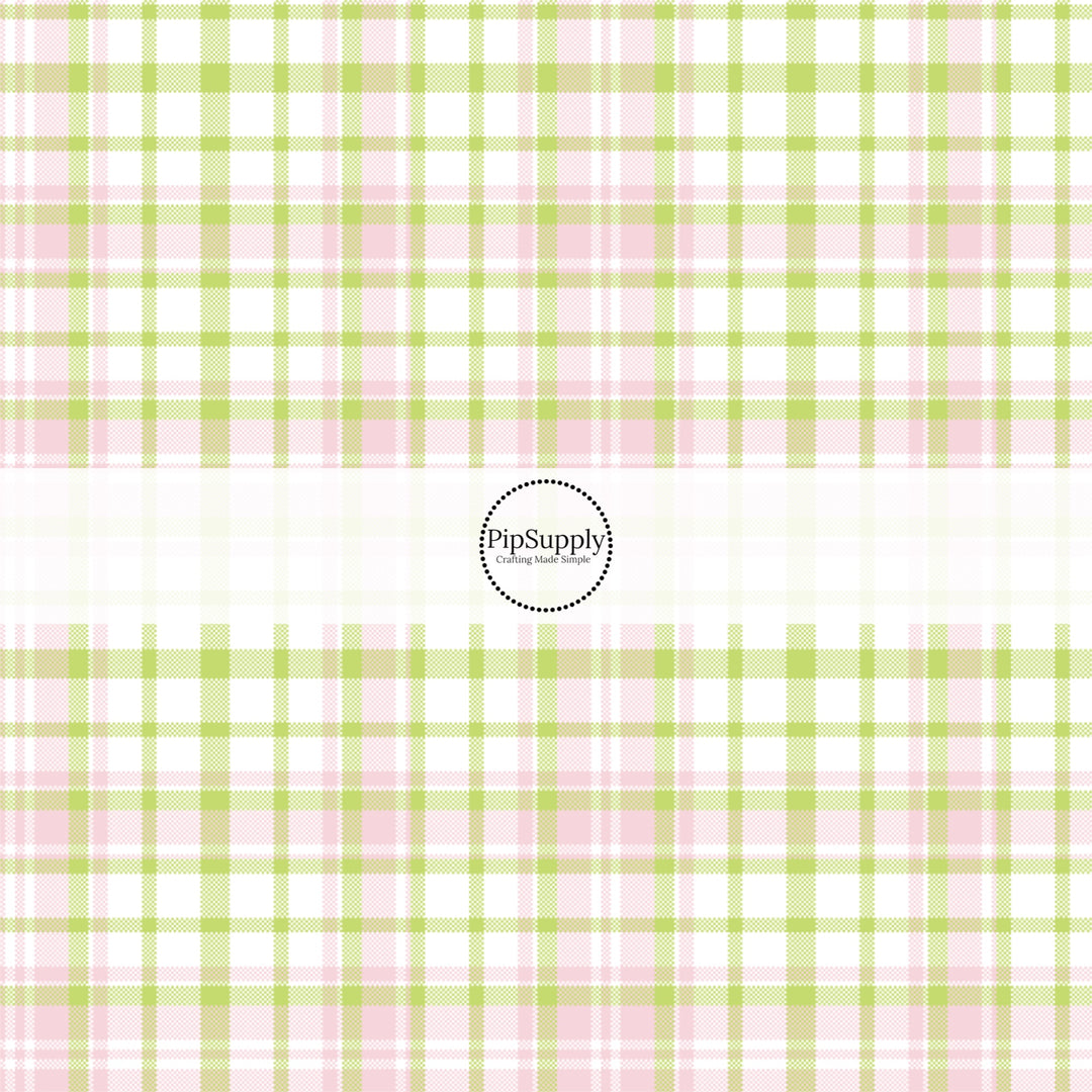 This spring themed fabric by the yard features pink and green plaid pattern. This fun pattern fabric can be used for all your sewing and crafting needs!