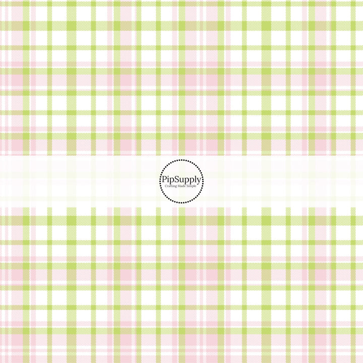 This spring themed fabric by the yard features pink and green plaid pattern. This fun pattern fabric can be used for all your sewing and crafting needs!