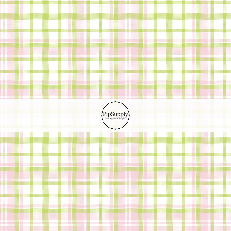 This spring themed fabric by the yard features pink and green plaid pattern. This fun pattern fabric can be used for all your sewing and crafting needs!