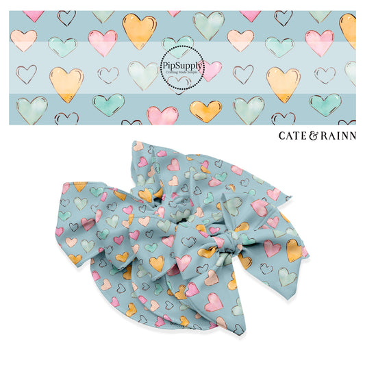 These heart themed blue no sew bow strips can be easily tied and attached to a clip for a finished hair bow. These fun summer heart themed bow strips features light pink, orange, and blue watercolor hearts on baby blue are great for personal use or to sell. 