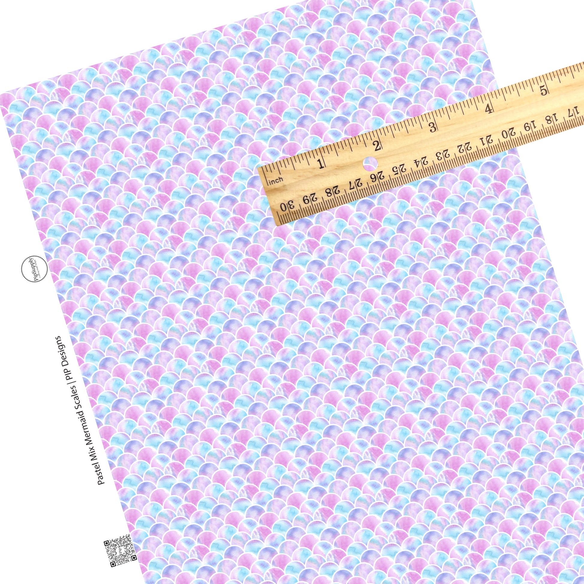 These beach faux leather sheets contain the following design elements: pink, purple, and blue mermaid scales. Our CPSIA compliant faux leather sheets or rolls can be used for all types of crafting projects.