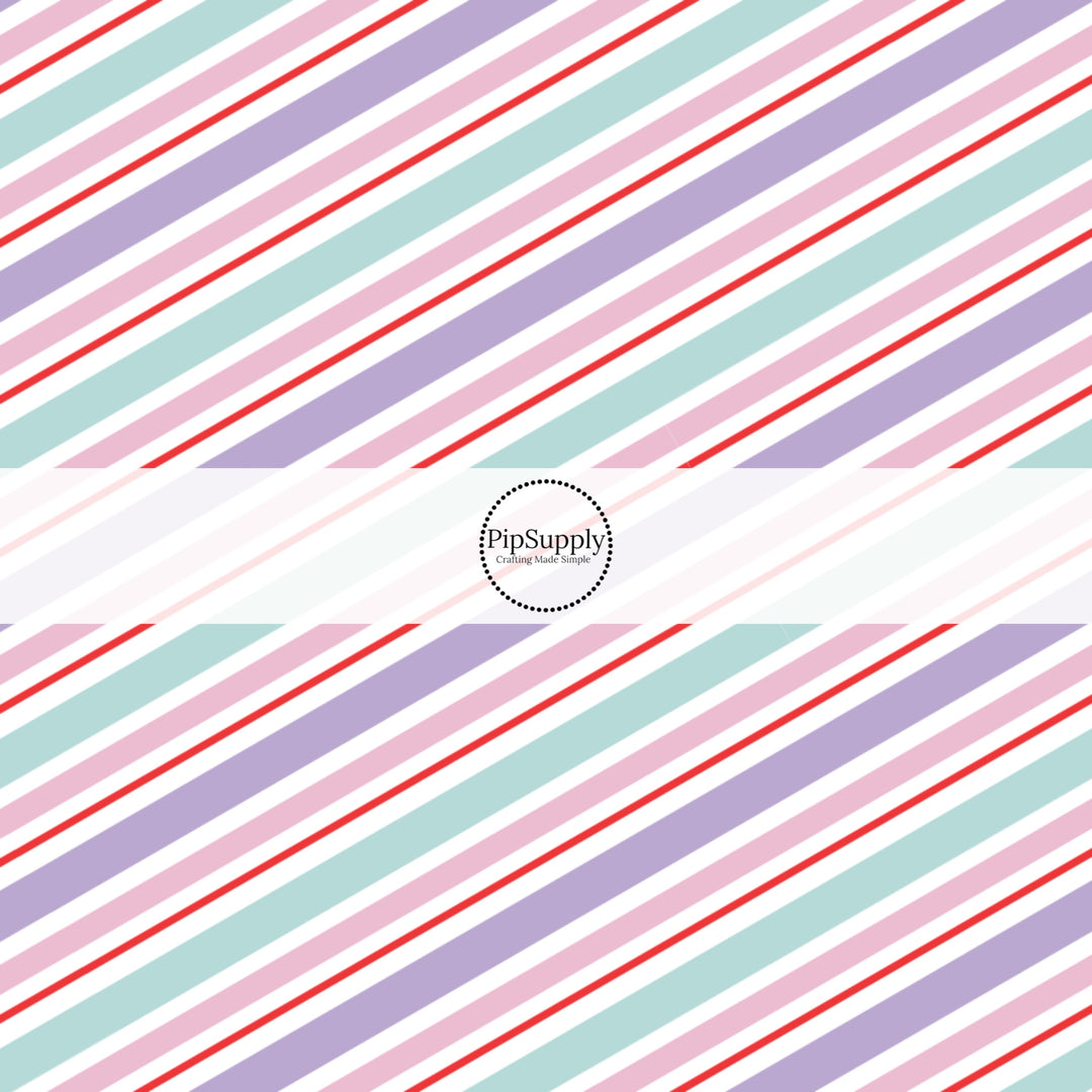 These winter stripe themed pattern fabric by the yard features the following design elements: Christmas pastel diagonal stripes. This fun themed fabric can be used for all your sewing and crafting needs!