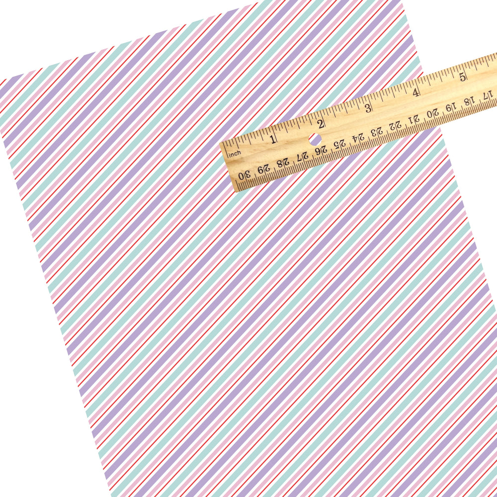 These winter stripe themed pattern faux leather sheets contain the following design elements: Christmas pastel diagonal stripes. Our CPSIA compliant faux leather sheets or rolls can be used for all types of crafting projects.