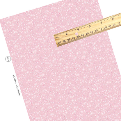 Light pink bandana pattern western themed faux leather sheet. 