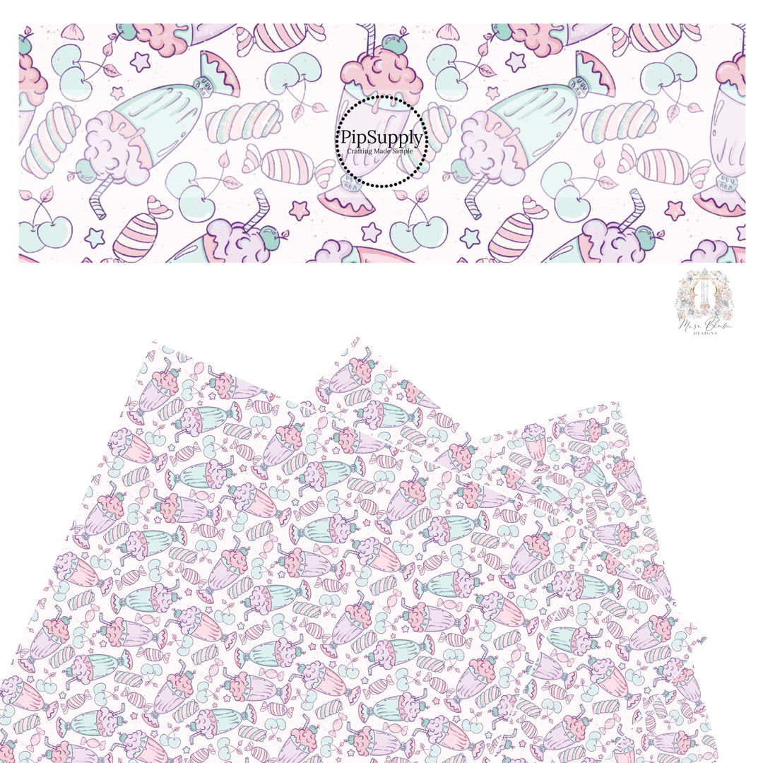 Pastel mint, light pink, light purple, and light aqua milkshakes, cherries, dessert, and candy on pink faux leather sheet.