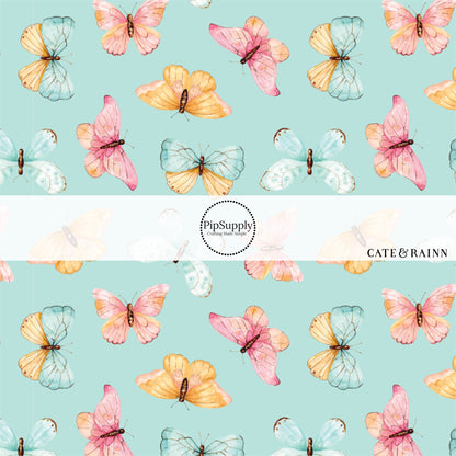 These butterfly themed blue no sew bow strips can be easily tied and attached to a clip for a finished hair bow. These fun summer butterfly themed bow strips features light pink, orange, and blue butterflies on blue are great for personal use or to sell.