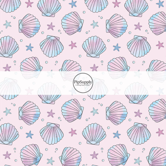 This pastel fabric by the yard features watercolor pink and purple sea shells. This fun summer themed fabric can be used for all your sewing and crafting needs!