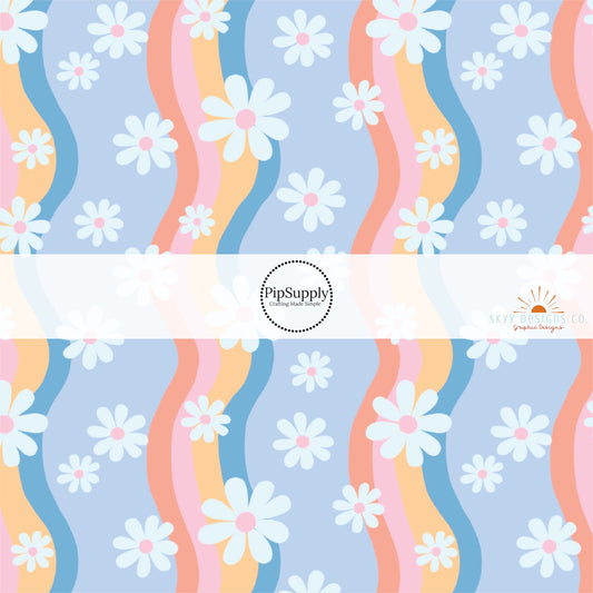 Wavy pastel rainbow stripes with white daisies with various sizes on periwinkle fabric by the yard. 