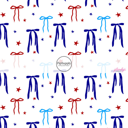 This 4th of July fabric by the yard features red and blue bows surrounded by tiny stars on white. This fun patriotic themed fabric can be used for all your sewing and crafting needs!