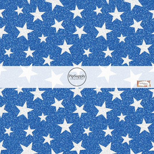 This 4th of July fabric by the yard features patriotic white stars on blue. This pattern has a glitter appearance. This fun patriotic themed fabric can be used for all your sewing and crafting needs!