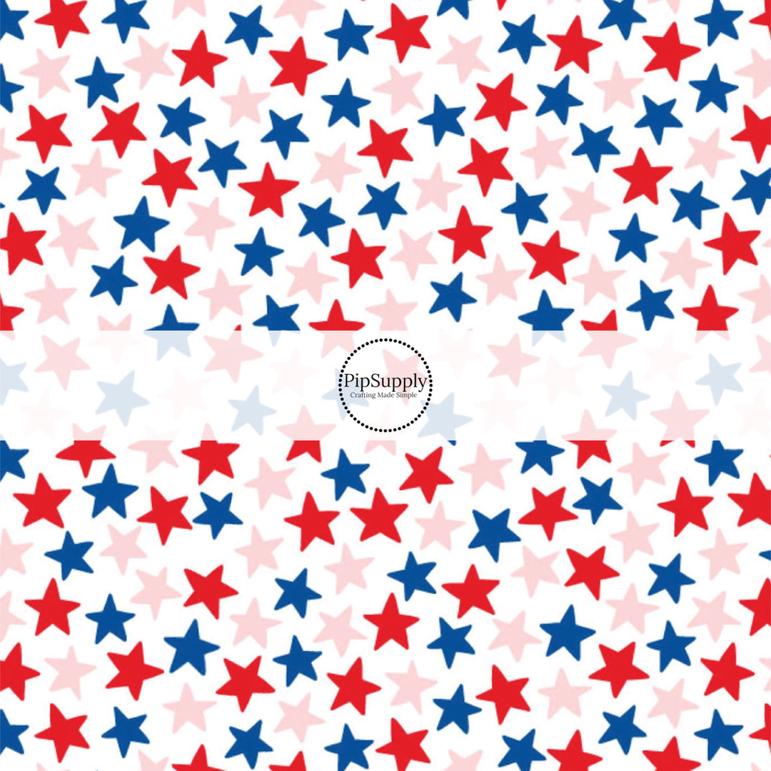 These patriotic fabric by the yard features blue, pink, and red stars. This fun pattern fabric can be used for all your sewing and crafting needs!