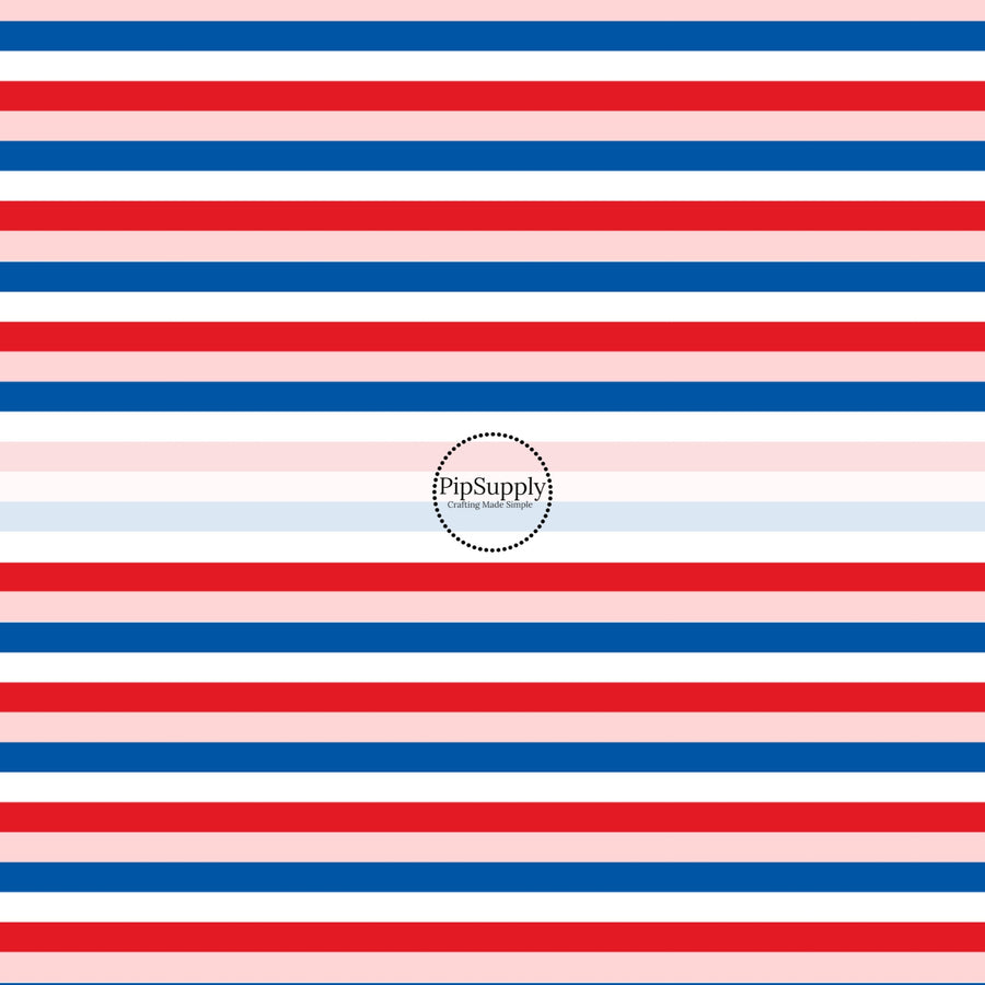 These patriotic fabric by the yard features blue, pink, and red stripes. This fun pattern fabric can be used for all your sewing and crafting needs!