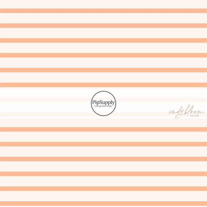 This summer fabric by the yard features cream and peach stripes. This fun summer themed fabric can be used for all your sewing and crafting needs!